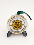 Laser-engraved wood ornament reading 'THE EXPEDITION' and '2026 PROSPER HIGH SCHOOL', displayed on a stand against a white background