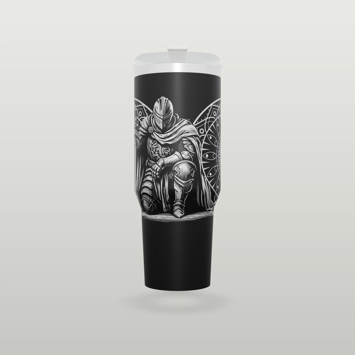 Black engraved knight tumbler spinning to show the full wrap design
